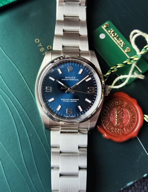 rolex oyster perpetual 34 silver 369 dial blue batons|rolex oyster perpetual date 36mm.